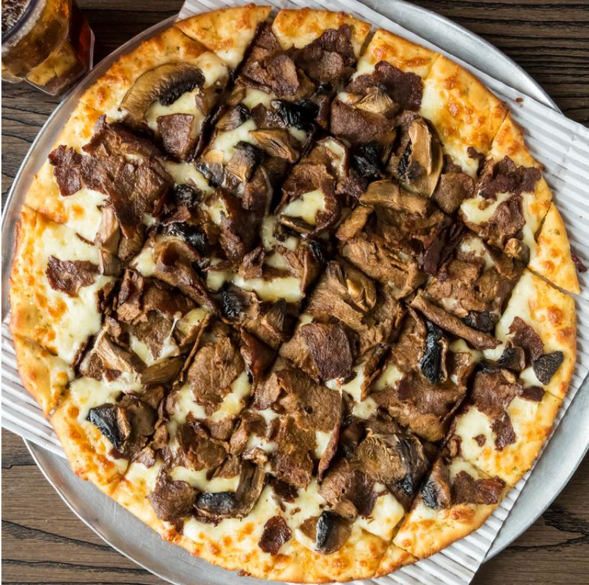 The Steak Portabella from Vick's Gourmet Pizzeria in Reynoldsburg is topped with sliced ribeye and portabella mushrooms.