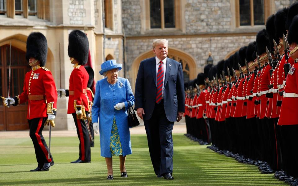 Former US president Donald Trump with Queen Elizabeth II at Windsor Castle, inspecting the Guard of Honour - Pablo Martinez Monsivais/AP