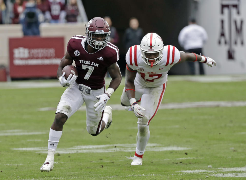 Texas A&M running back Jashaun Corbin (7) breaks away from Mississippi Rebels linebacker Willie Hibbler (17) during the second half of an NCAA college football game Saturday, Nov. 10, 2018, in College Station, Texas. Texas A&M won 38-24. (AP Photo/David J. Phillip)