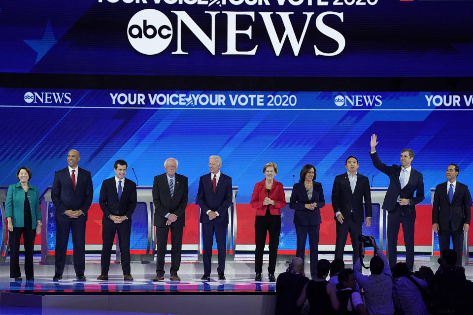 From left, Democratic presidential candidates Sen. Amy Klobuchar, D-Minn., Sen. Cory Booker, D-N.J., South Bend Mayor Pete Buttigieg, Sen. Bernie Sanders, I-Vt., former Vice President Joe Biden, Sen. Elizabeth Warren, D-Mass., Sen. Kamala Harris, D-Calif., entrepreneur Andrew Yang, former Texas Rep. Beto O'Rourke and former Housing Secretary Julian Castro are introduced Thursday, Sept. 12, 2019, before a Democratic presidential primary debate hosted by ABC at Texas Southern University in Houston. (AP Photo/David J. Phillip)