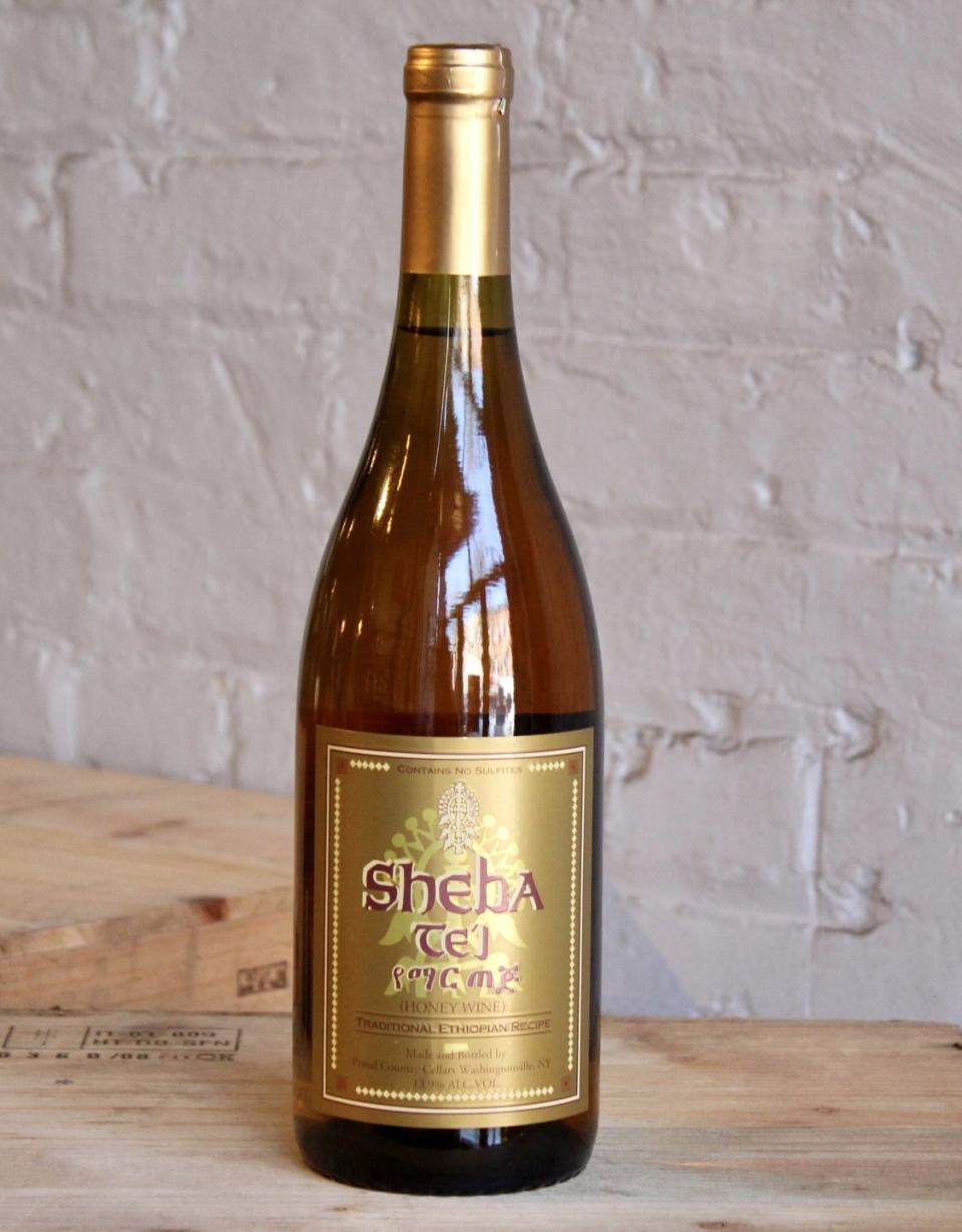 <p>Tej is an Ethiopian wine made from fermented honey. Palmer compares tej to mead just with a slightly bitter taste, thanks to the addition of medicinal herbs. Palmer notes it's rarely mass-produced and is a bit of a "bucket list find," so <a href="https://www.gnarlyvines.com/sheba-tej-honey-wine-washingtonville-ny.html" rel="nofollow noopener" target="_blank" data-ylk="slk:shop it here;elm:context_link;itc:0;sec:content-canvas" class="link ">shop it here</a> while it's in stock.</p>