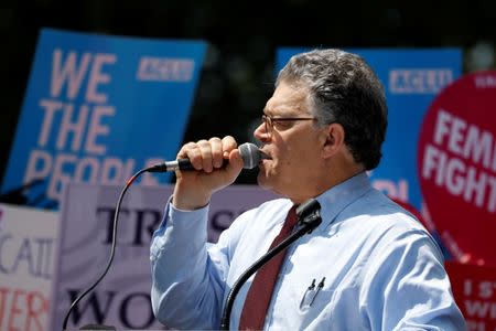 Sen. Al Franken (D-MN) speaks during a demonstration against the Republican repeal of the Affordable Care Act, outside the U.S. Capitol in Washington, U.S., June 21, 2017. REUTERS/Aaron P. Bernstein