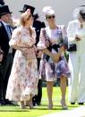 <p>Zara Phillips opted for a printed puffed-sleeve knee-length dress with a matching fascinator. </p>