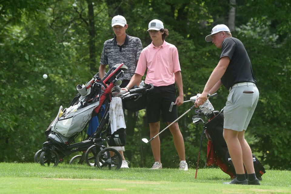 Clay Bruning approaches the green with an iron while participating in the Licking County Junior Golf Association's final event of the season on Monday, July 25, 2022 at Clover Valley Golf Club in Johnstown.