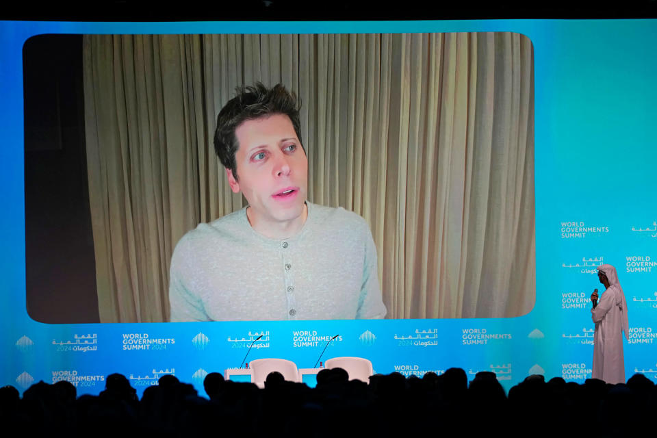 OpenAI CEO Sam Altman appears via video call at a conference in Dubai on Feb. 13, 2024.<span class="copyright">Kamran Jebreili—AP</span>