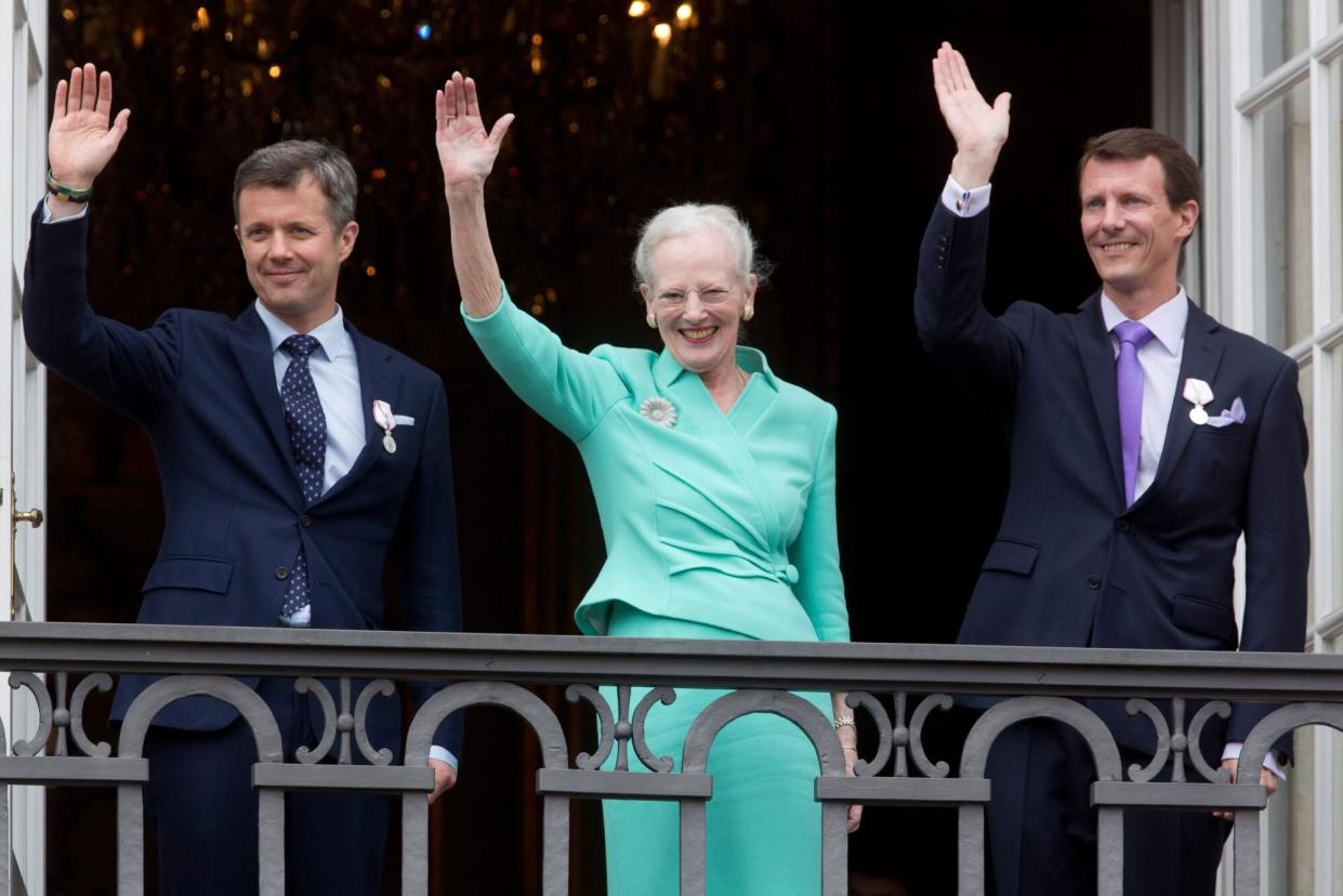 COPENHAGEN, DENMARK - APRIL 16: Queen Margrethe II of Denmark, and her sons Crown Prince Frederik of Denmark (L) and Prince Joachim of Denmark (R) appear on the Balcony of Amalienborg Palace on her 75th Birthday, on April 16, 2015 in Copenhagen, Denmark.(Photo by Julian Parker/UK Press via Getty Images)