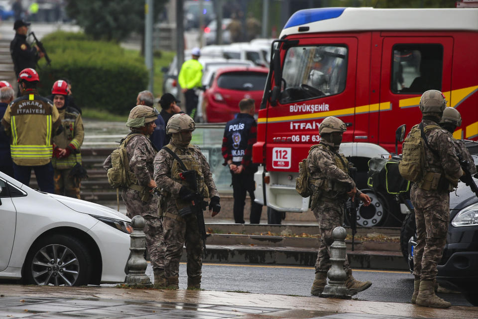 Turkish security forces cordon off an area after an explosion in Ankara, Sunday, Oct. 1, 2023. A suicide bomber detonated an explosive device in the heart of the Turkish capital, Ankara, on Sunday, hours before parliament was scheduled to reopen after a summer recess. A second assailant was killed in a shootout with police. (AP Photo/Ali Unal)