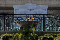 An eternal flame burns at the tomb of the Rev. Martin Luther King Jr. and his wife, Coretta Scott King, on Monday, Jan. 18, 2021, in Atlanta. (AP Photo/Branden Camp)