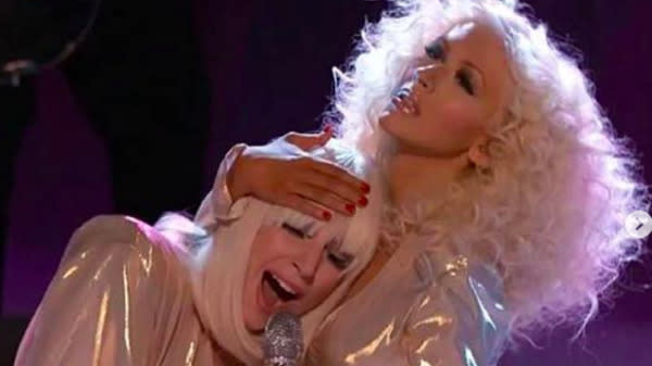 Christina Aguilera is standing with Lady Gaga as a fellow "survivor of past