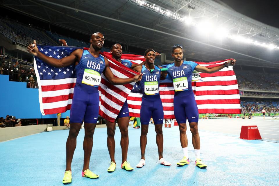 <p>(L-R) Lashawn Merritt, Gil Roberts, Tony McQuay and Arman Hall of the United States react after winning gold in the Men’s 4 x 400 meter Relay on Day 15 of the Rio 2016 Olympic Games at the Olympic Stadium on August 20, 2016 in Rio de Janeiro, Brazil. (Photo by Ezra Shaw/Getty Images) </p>