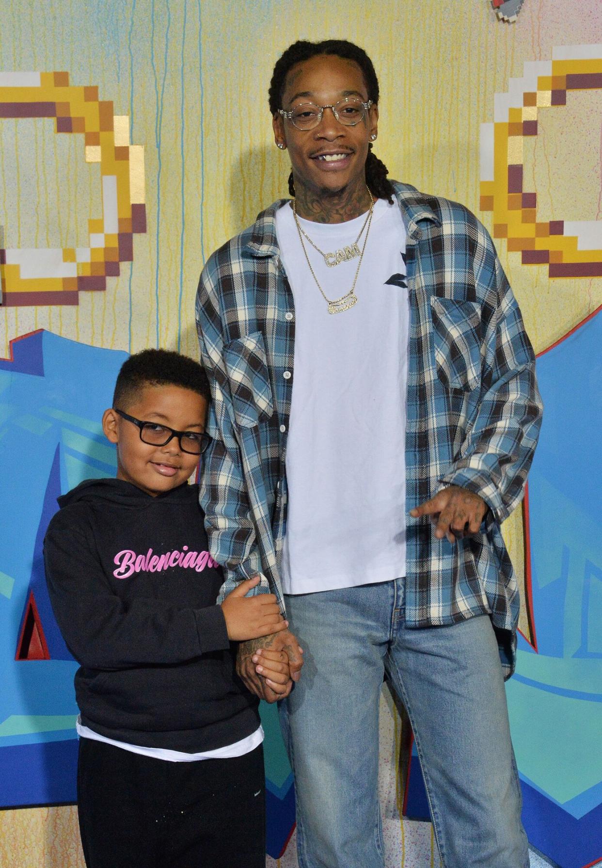 US rapper Wiz Khalifa and his son Sebastian Taylor Thomaz attend a special screening of the sci-fi family comedy adventure film "Sonic the Hedgehog" at the Regency Village Theatre in the Westwood section of Los Angeles on Wednesday, February 12, 2020. Storyline: Based on the global blockbuster videogame franchise from Sega, "Sonic" tells the story of the world's speediest hedgehog as he embraces his new home on Earth. In this live-action adventure comedy, Sonic and his new best friend Tom (James Marsden) team up to defend the planet from the evil genius Dr. Robotnik (Jim Carrey) and his plans for world domination. Sonic the Hedgehog, Los Angeles, California, United States - 13 Feb 2020