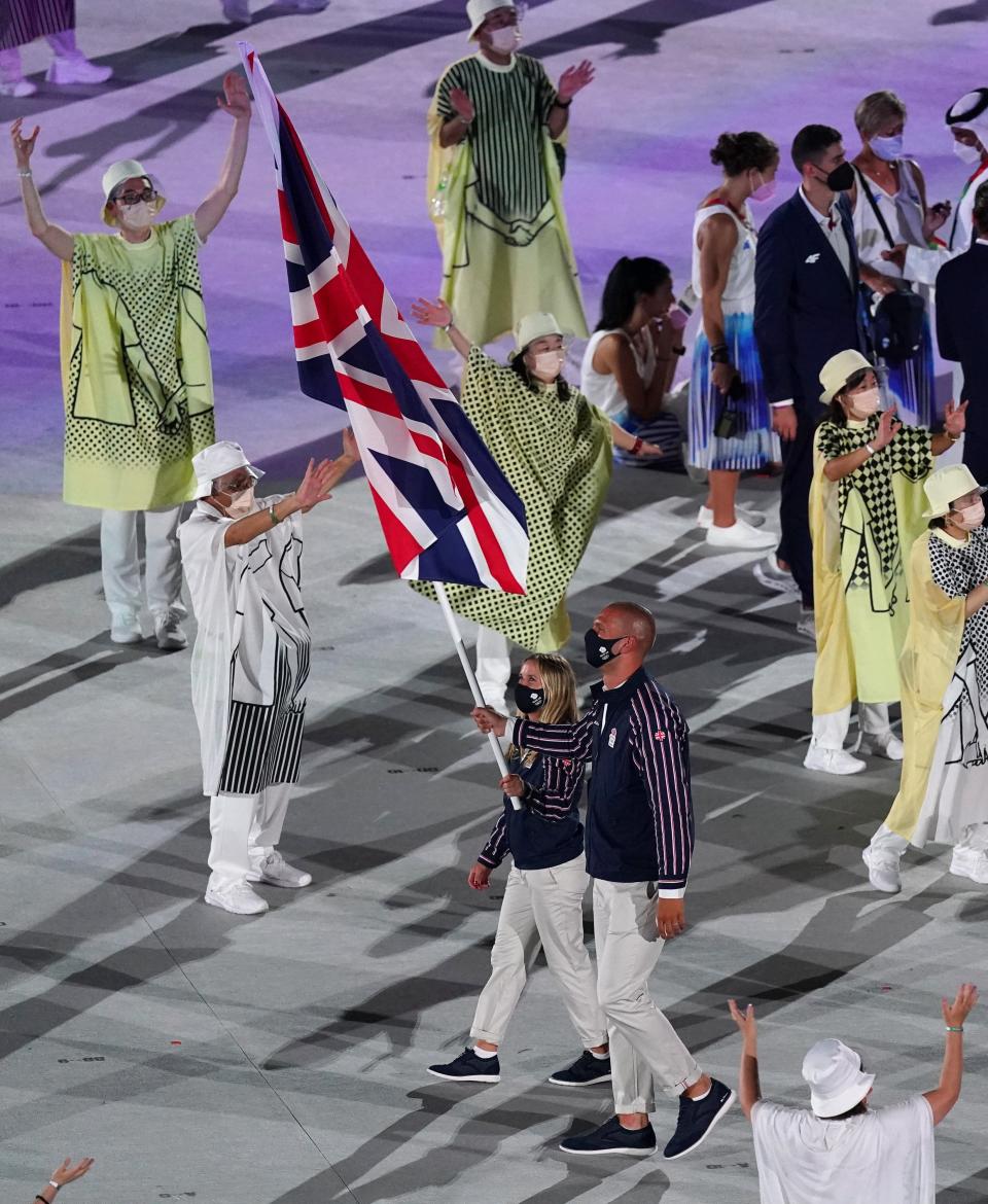 Hannah Mills carried the flag with Mohamed Sbihi during the opening ceremony (PA) (PA Wire)