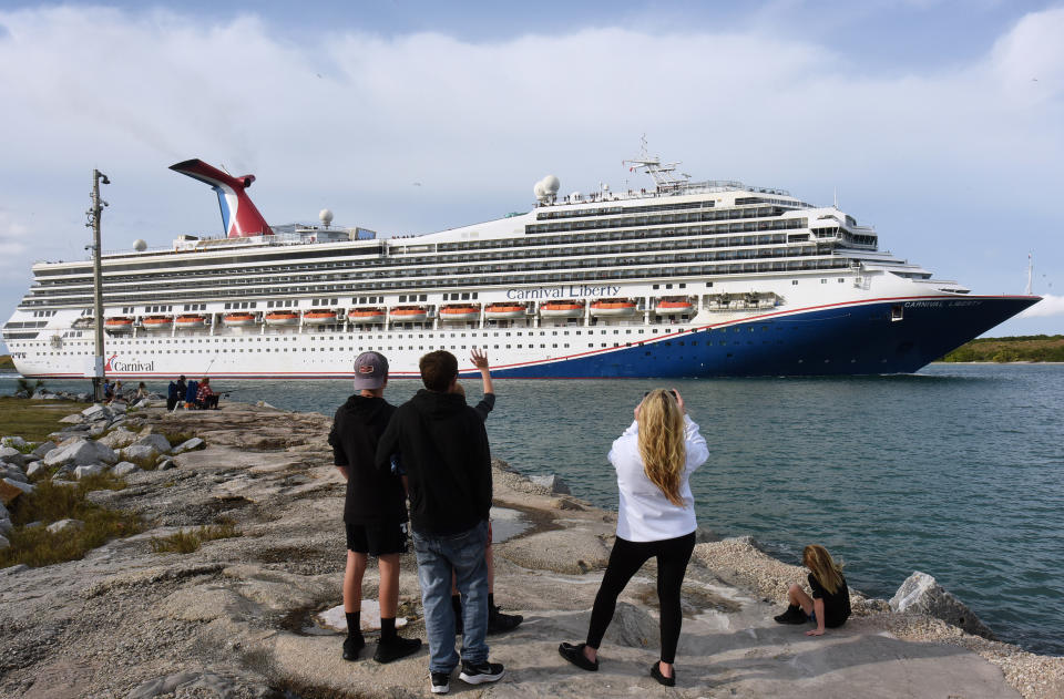 PORT CANAVERAL, FLORIDA, UNITED STATES - 2022/01/28: People watch as the Carnival Liberty cruise ship departs from Port Canaveral.
Five cruise lines have resumed regular sailings from Port Canaveral as COVID-19 infections are decreasing and ship operators have instituted stringent safety protocols to prevent the spread of the virus. (Photo by Paul Hennessy/SOPA Images/LightRocket via Getty Images)