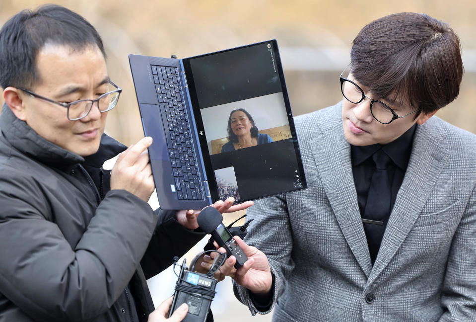 FILE - Vietnamese woman Nguyen Thi Thanh is seen on a computer monitor as she speaks outside the court at the Seoul Central District Court in Seoul, South Korea, Tuesday, Feb. 7, 2023. South Korea’s top military official on Friday, Feb. 17, insisted the country’s soldiers didn’t commit any massacres during the Vietnam War and indicated the government will appeal a ruling that ordered compensation for the Vietnamese woman who lost several relatives to a shooting rampage blamed on South Korean marines in 1968. (Ryu Young-suk/Yonhap via AP, File)