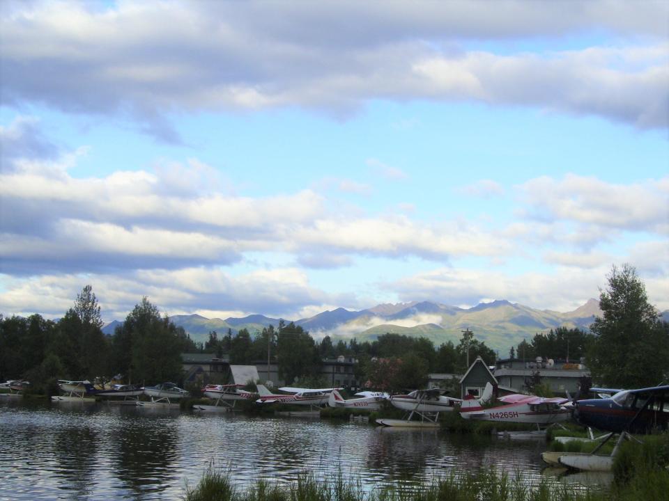 Watch the float planes come in for a landing on Lake Hood from the  Millennium Lakefront Anchorage.