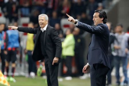 Football Soccer - Nice v Paris St Germain - French Ligue 1 - Allianz Riviera Stadium, Nice, France, 30/04/2017. Paris St Germain's coach Unai Emery (R) and Nice's coach Lucien Favre react. REUTERS/Eric Gaillard