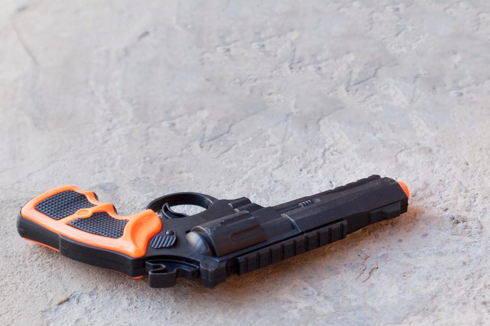 New York tightened its regulations around toy guns in the state this week, requiring them to be translucent or covered completely in a bright color to ensure they can be differentiated from a real firearm. This toy gun has an orange plug on the end, as separately required by federal law.