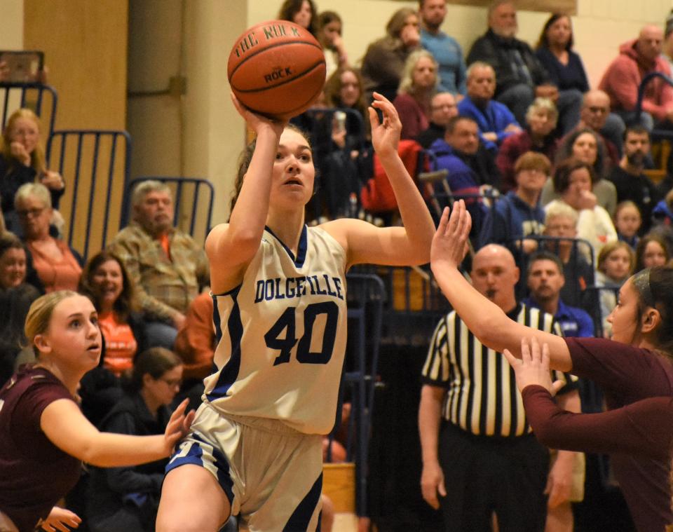 Molly Rauch puts up a shot for Dolgeville Tuesday during the first quarter of a Section III playoff victory over Port Byron.