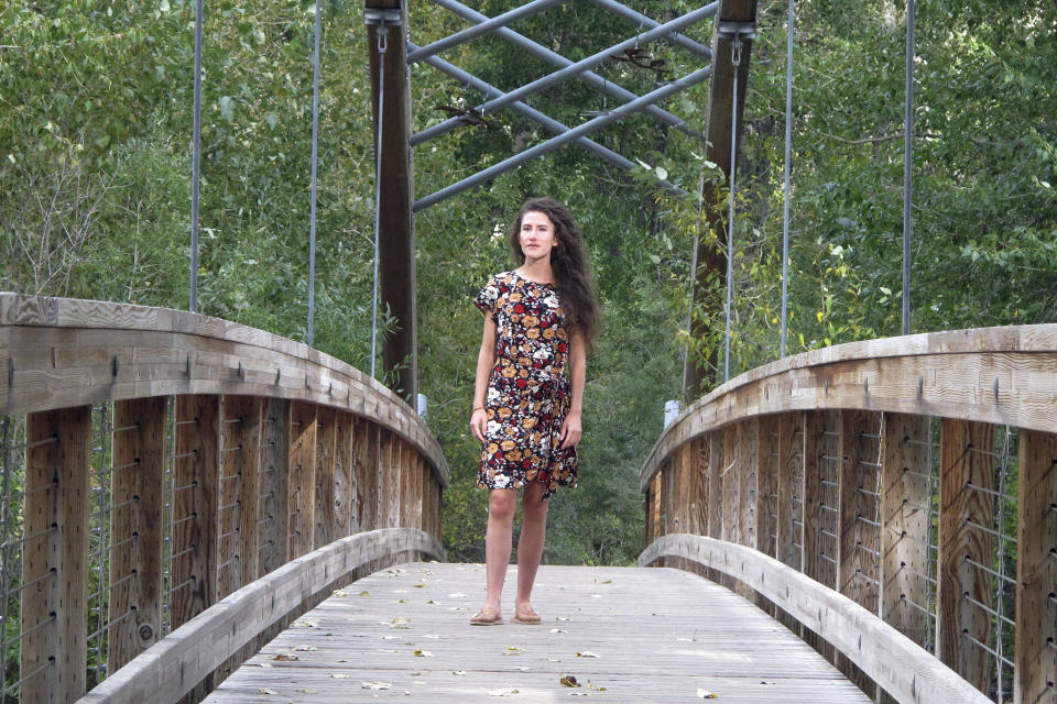 Chelsea Goodrich poses for a portrait in Ketchum, Idaho, on Tuesday, Sept. 19, 2023. Goodrich's father, a popular Idaho dentist and former bishop in The Church of Jesus Christ of Latter-day Saints, widely known as the Mormon church, was excommunicated after sharing details about his relationship with her when she was a child during a religious confession. Recordings obtained by The Associated Press show that instead of helping prosecutors, the church used a legal playbook that has helped protect itself from sex abuse claims. Goodrich's father is today a free man, and she says she decided to speak out to protect other children. (AP Photo/Jason Dearen)