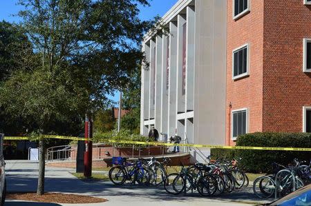 Crime scene tape is seen in front of the library at Florida State University, in Tallahassee, Florida, November 20, 2014. REUTERS/Bil Cotterell