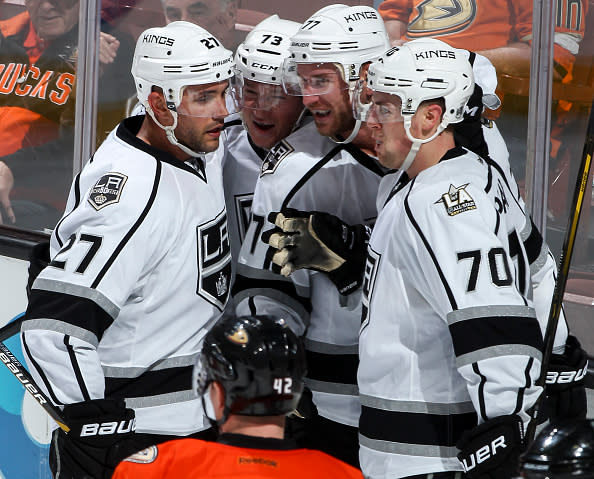 ANAHEIM, CA - NOVEMBER 20: Jeff Carter #77 of the Los Angeles Kings celebrates his second-period goal with Alec Martinez #27, Tyler Toffoli #73 and Tanner Pearson #70 during the game against the Anaheim Ducks at Honda Center on November 20, 2016 in Anaheim, California. (Photo by Debora Robinson/NHLI via Getty Images)