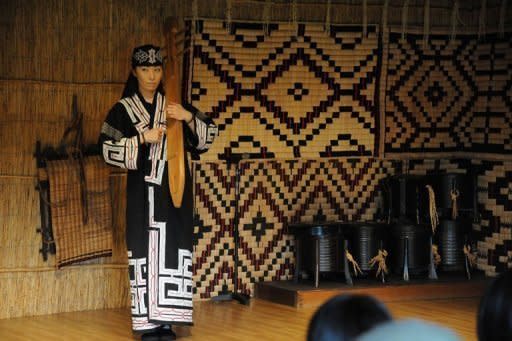 An indigenous Aibu woman plays a harp at the Nibutani Ainu Museum at Biratori in Japan's northern island of Hokkaido. Japan's Ainu ethnic minority have launched an ambitious bid to win 10 seats at next year's parliamentary elections, in the latest move aimed at boosting recognition for what was once a hunter-gatherer society in Japan's northernmost Hokkaido island