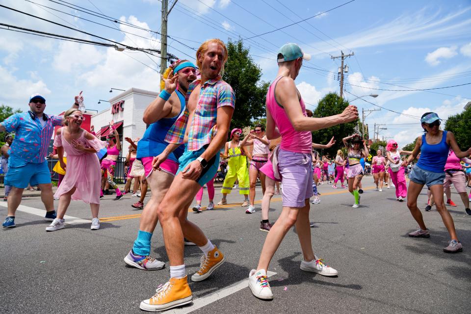 DANCEFIX dance in full Barbie-inspired outfits on Tuesday, July 4, 2023, during the Northside Fourth of July Parade on Hamilton Avenue in Cincinnati.