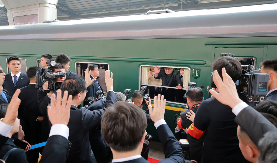 Kim Jong Un is seen departing on the train from Beijing (AFP)