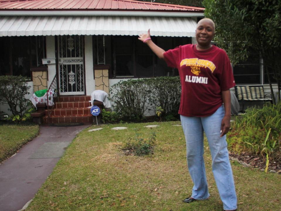 Sylvia Jones is seen outside of the home she grew up in on Fort King Street near Martin Luther King, Jr. Avenue in Ocala on Jan. 28, 2014.