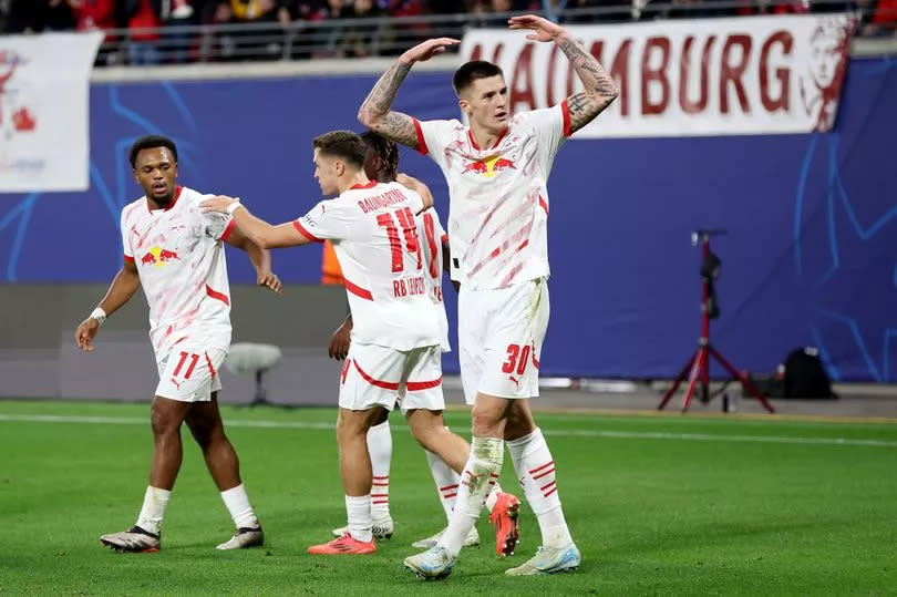 Benjamin Sesko celebrates scoring his team's first goal during the UEFA Champions League 2024/25 League Phase MD2 match between RB Leipzig and Juventus.