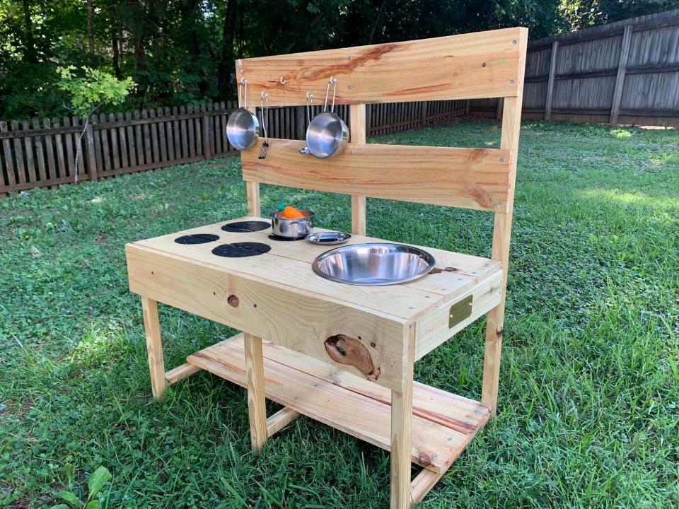 This is the mud kitchen Ally Bush helped construct as part of a Girl Scout project for the Trinity Learning Center at First Farragut United Methodist Church. She received a Gold Award by the Scouts for her efforts.