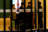 North Korean Ambassador to Malaysia Kang Chol (2nd R) arrives at the VIP exit of the Beijing Capital International Airport in Beijing, China March 7, 2017. REUTERS/Tyrone Siu