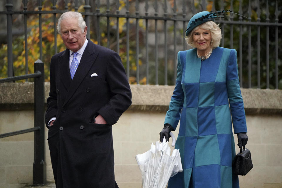 Britain's Prince Charles and Camilla, Duchess of Cornwall, arrive to attend the Christmas Day morning church service at St George's Chapel, Windsor Castle, England, December 25, 2021. / Credit: Jonathan Brady/AP
