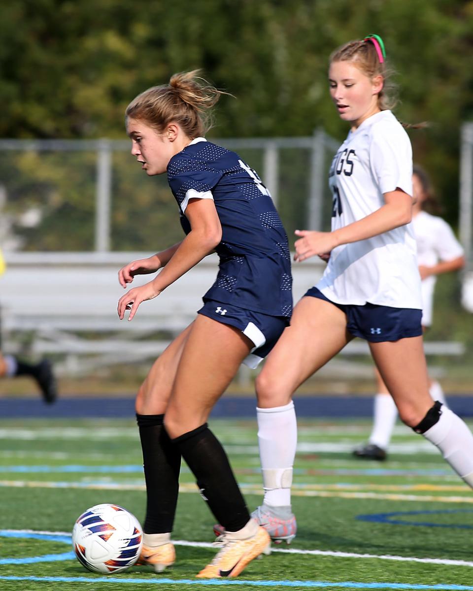 Cohasset's Ava Carcio slots the shot into the net for the second goal to make it 2-0 in the first half of their game at Cohasset High School on Wednesday, Sept. 27, 2023. Cohasset would go on to win 4-1.