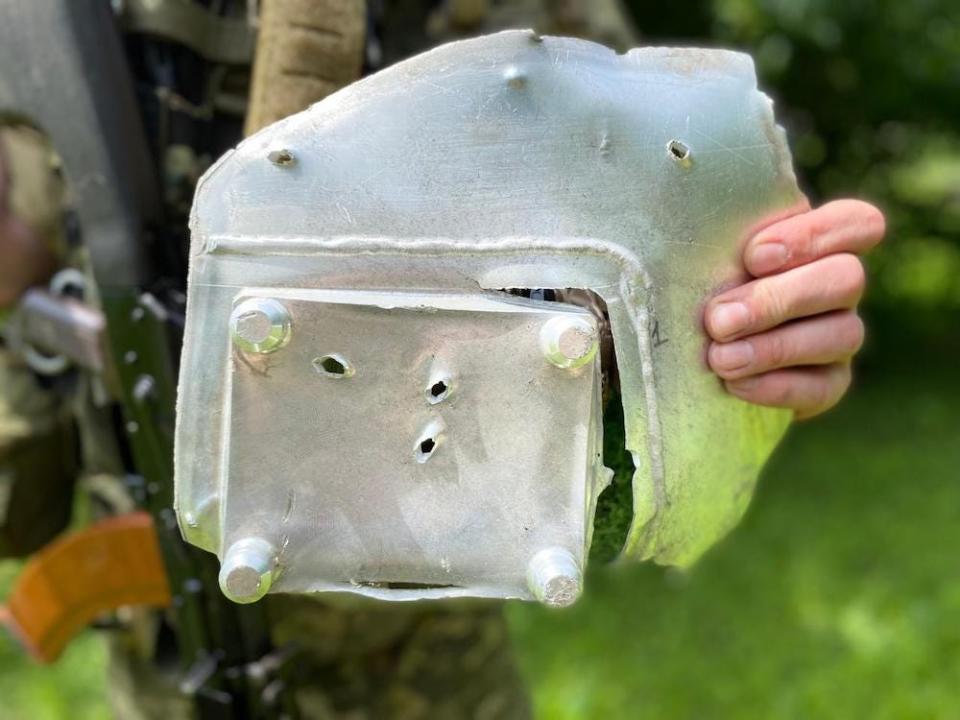 A close-up of a pocked and pierced piece of metal debris which the Ukrainian air force claims is the remains of a cruise missile shot down by the machine gun of a soldier named Serhii on June 12, 2024. The picture was released on June 21, 2024.