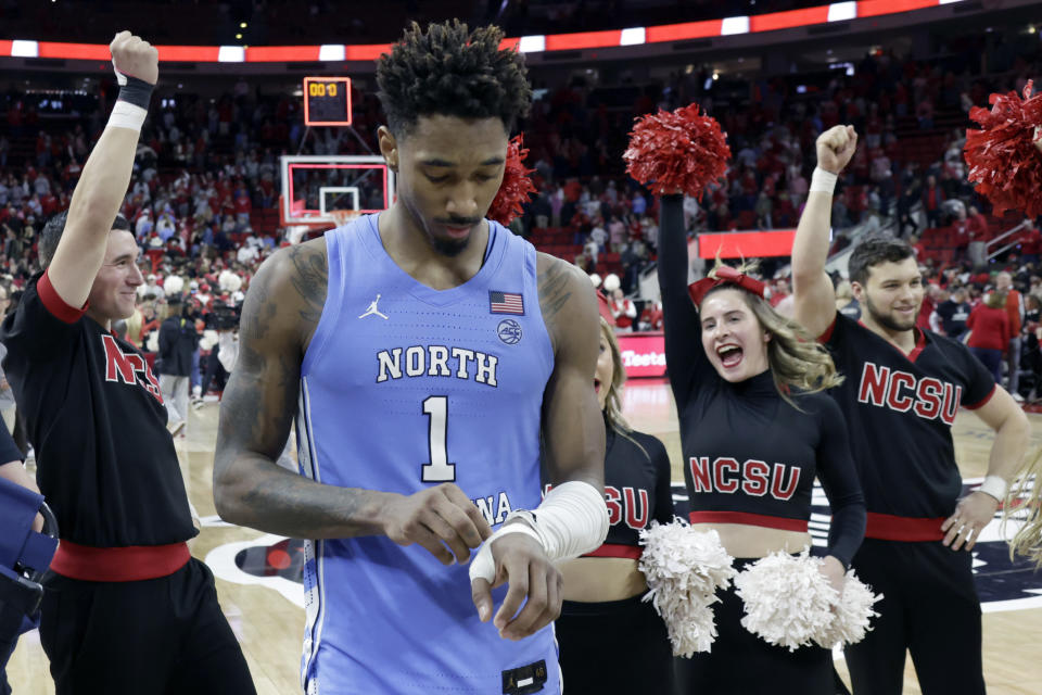 North Carolina forward Leaky Black (1) walks off the court after his team lost to North Carolina State in an NCAA college basketball game, Sunday, Feb. 19, 2023, in Raleigh, N.C. (AP Photo/Chris Seward)