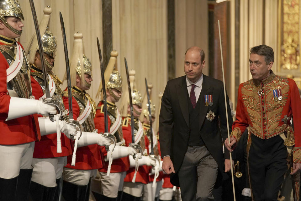 Britain's Prince William walks through the Norman Porch for the State Opening of Parliament in the House of Lords at the Palace of Westminster, in London, Tuesday, May 10, 2022. Britain’s Parliament is opening a new year-long session with Prime Minister Boris Johnson trying to re-energize his scandal-tarnished administration and address the U.K.’s worsening cost-of-living crisis. (Aaron Chown/Pool Photo via AP)