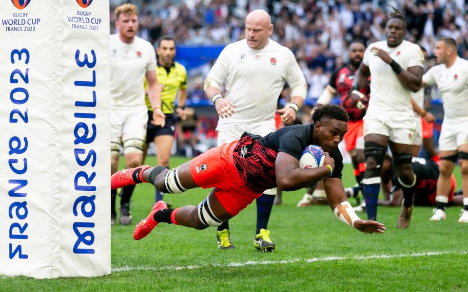 Viliame Mata of Fiji scores a try during the Rugby World Cup quarter-final against England in Marseille