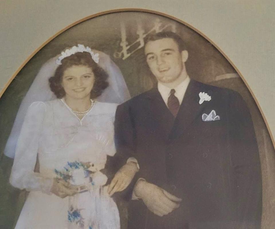 A photo of Gretchen Morgan's wedding day with her late husband, Byron, hangs on the wall in her room at Carolina Reserve of Hendersonville. It was taken on Nov. 27, 1941.