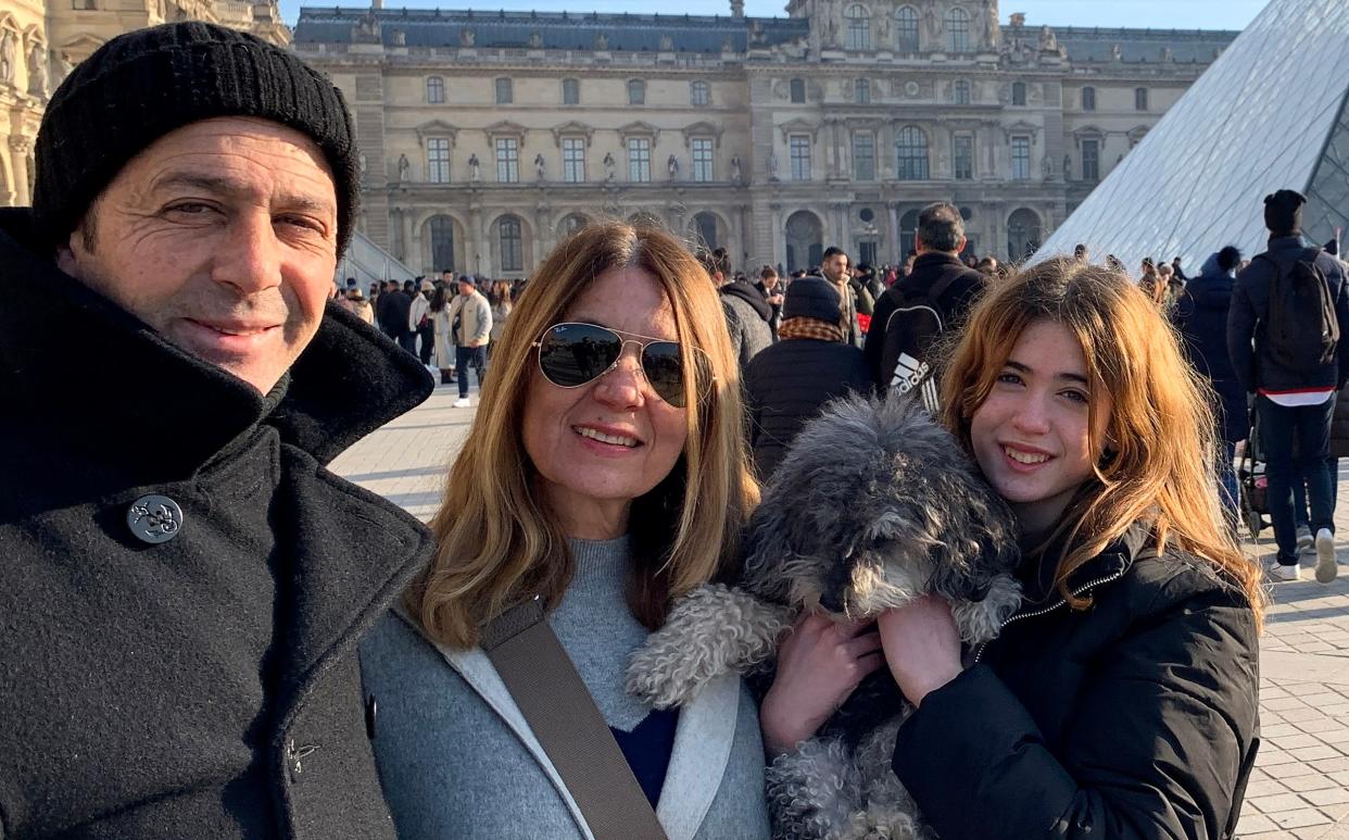 Mariano Janin, his wife Marisa, their daughter Mia and her dog, Lola