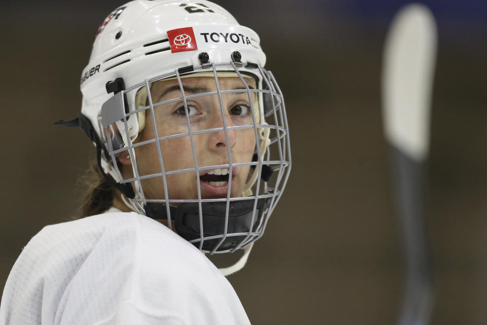 FILE - United States' Hilary Knight (21) looks on during practice at the LECOM Harborcenter rink in Buffalo, N.Y., Tuesday, Aug. 16, 2022. Knight will be competing in her 13th world tournament when the world championships begin Wednesday, April 5. (AP Photo/Joshua Bessex, File)