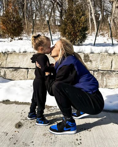 <p>Brittany Mahomes/Instagram</p> Brittany Mahomes and her daughter Sterling share a kiss.