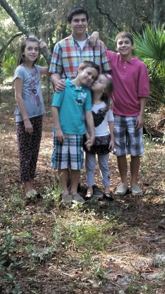 All adopted, two sibling groups. We adopted the oldest three together, on National Adoption day 2009.