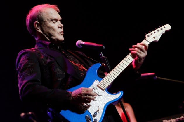 Glen Campbell performs as part of his farewell tour in 2011. A reimagined version of his album 'Ghost on the Canvas' pairs Campbell with guests like Eric Church, Dolly Parton, and Sting. - Credit: Lawrence K. Ho/Los Angeles Times/Getty Images