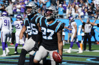 Carolina Panthers safety Kenny Robinson (27) celebrates his touchdwn after a blocked punt against the Minnesota Vikings during the second half of an NFL football game, Sunday, Oct. 17, 2021, in Charlotte, N.C. (AP Photo/Jacob Kupferman)