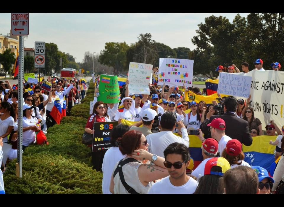 Hundreds swarm in front of the Federal building on Wilshire Boulevard in Los Angeles, California.