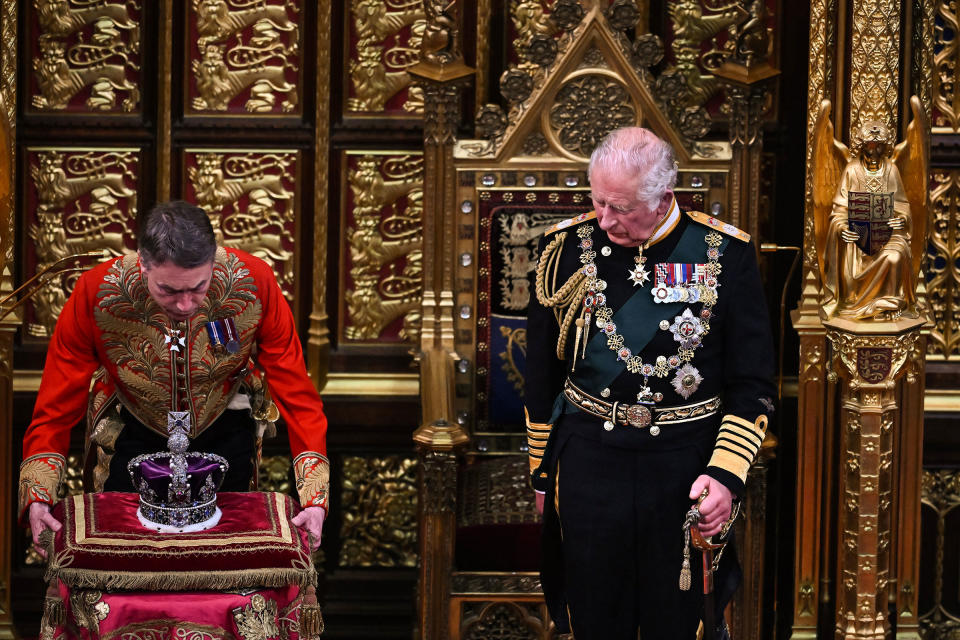 Prince Charles looks at The Imperial State Crown after delivering a speech during the State Opening of Parliament in the House of Lords at the Palace of Westminster on May 10, 2022 in London.<span class="copyright">Ben Stansall—WPA Pool—Getty Images</span>