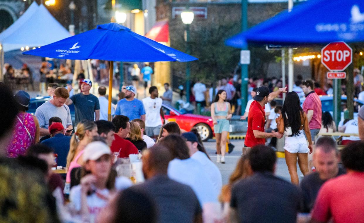 Little 500 revelers crowd Kirkwood Avenue in downtown Bloomington in 2022.