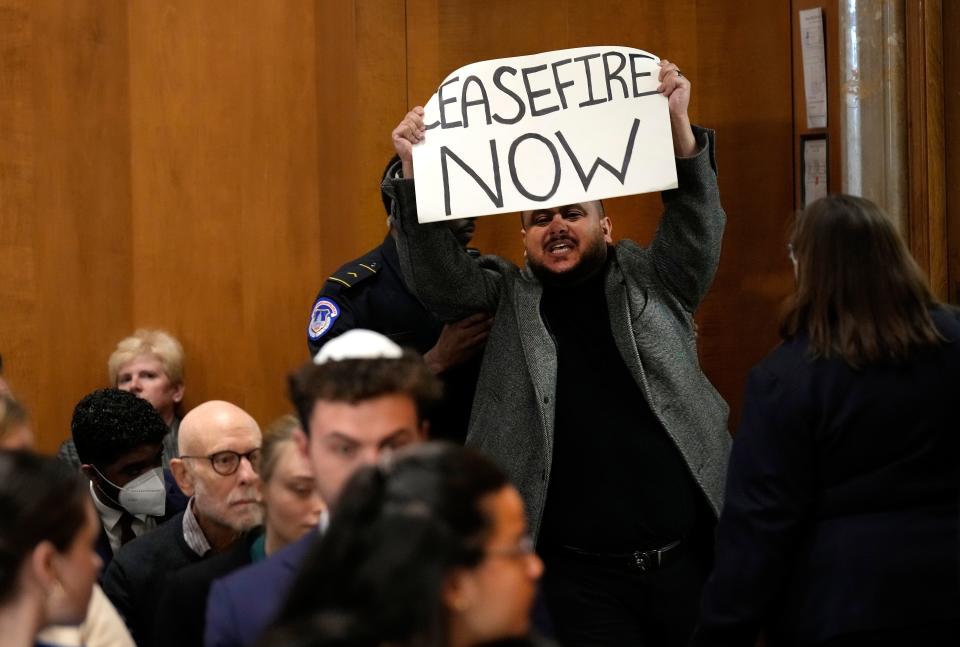 A protester demonstrates as Jack Lew, President Joe Biden’s nominee to be the U.S. ambassador to Israel, testifies during a Senate Foreign Relations Committee confirmation hearing on Capitol Hill October 18, 2023 in Washington, DC. Lew, a former Treasury Secretary under President Barack Obama, was nominated by Biden in September after former U.S. ambassador to Israel Thomas Nides left the position over the summer.