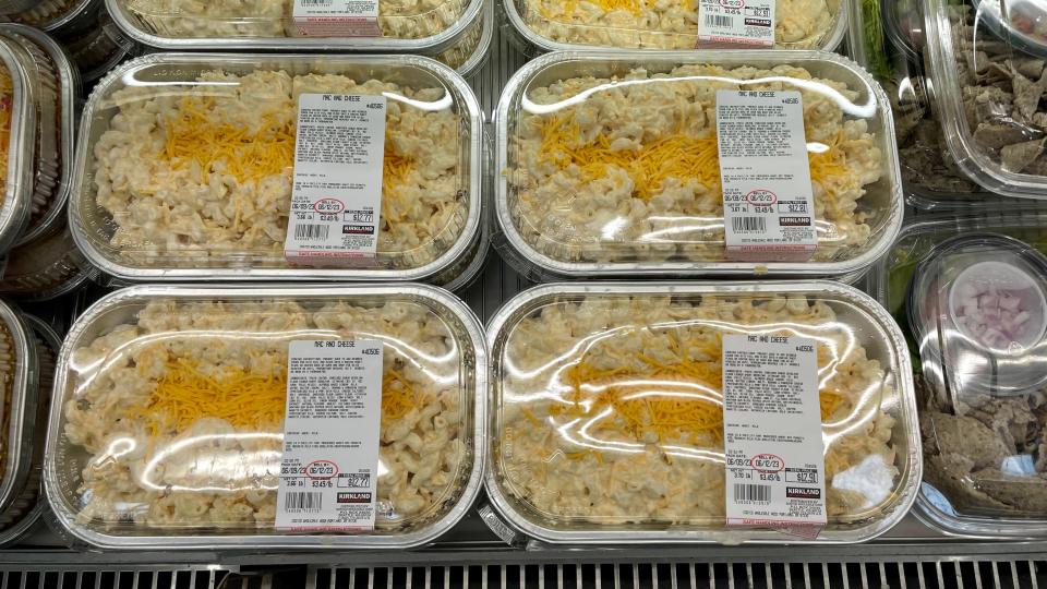 kirkland Mac and cheese in plastic containers in a costco display